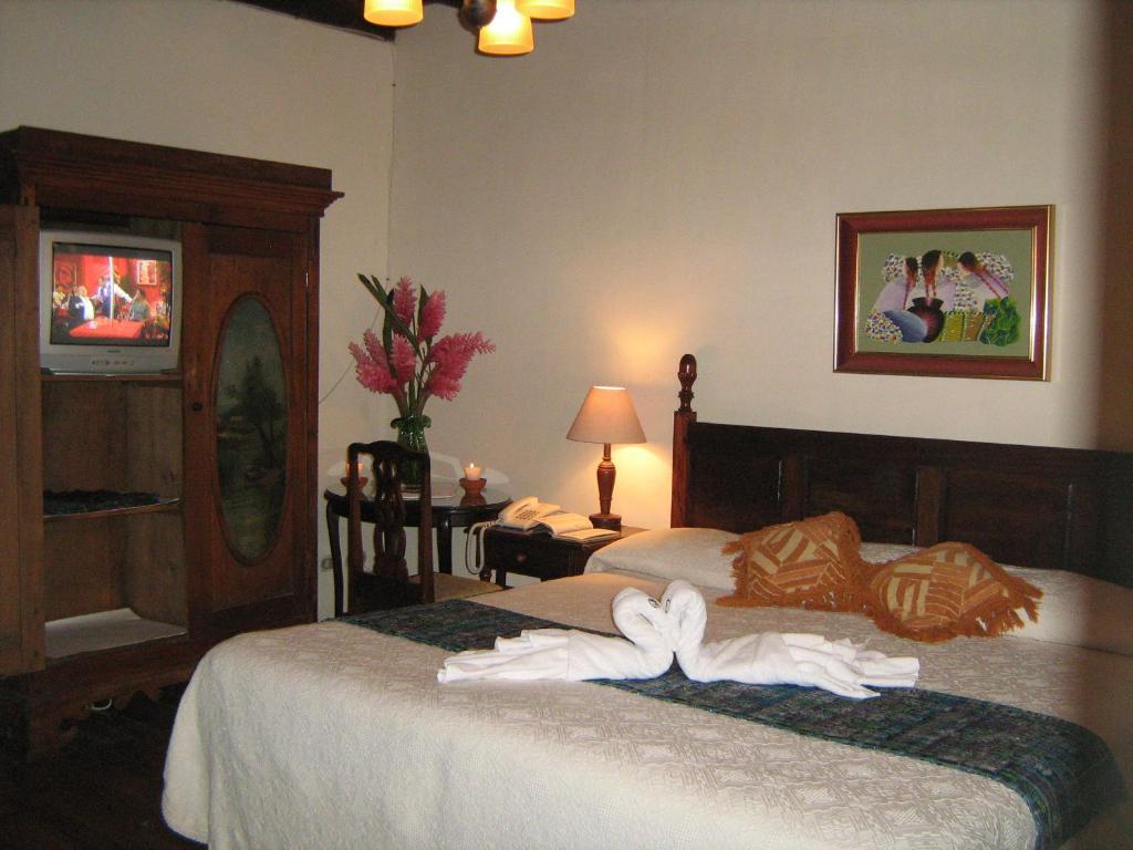 Hotel Posada De Maria Antigua Quarto foto